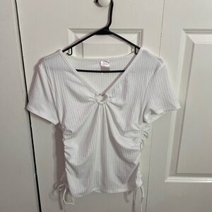 White top with heart embellishment